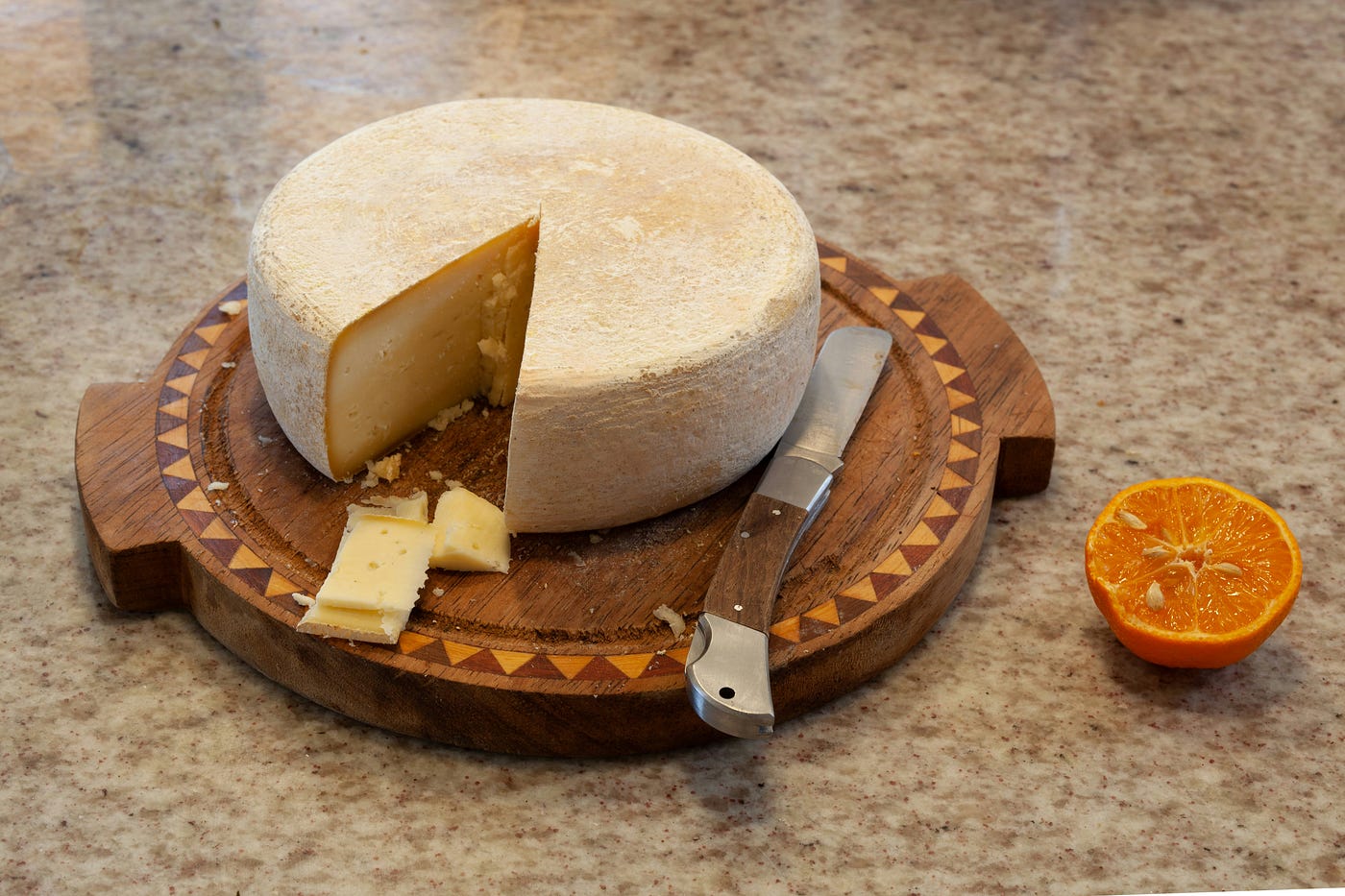 Looks more like brie, but you get the idea. / Photo by PROJETO CAFÉ GATO-MOURISCO on Unsplash
