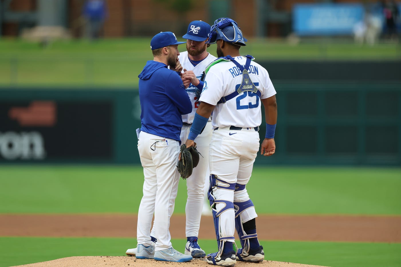 Logan Allen with Comets pitching coach David Anderson and catcher Chuckie Robinson during a visit (Eddie Kelly).