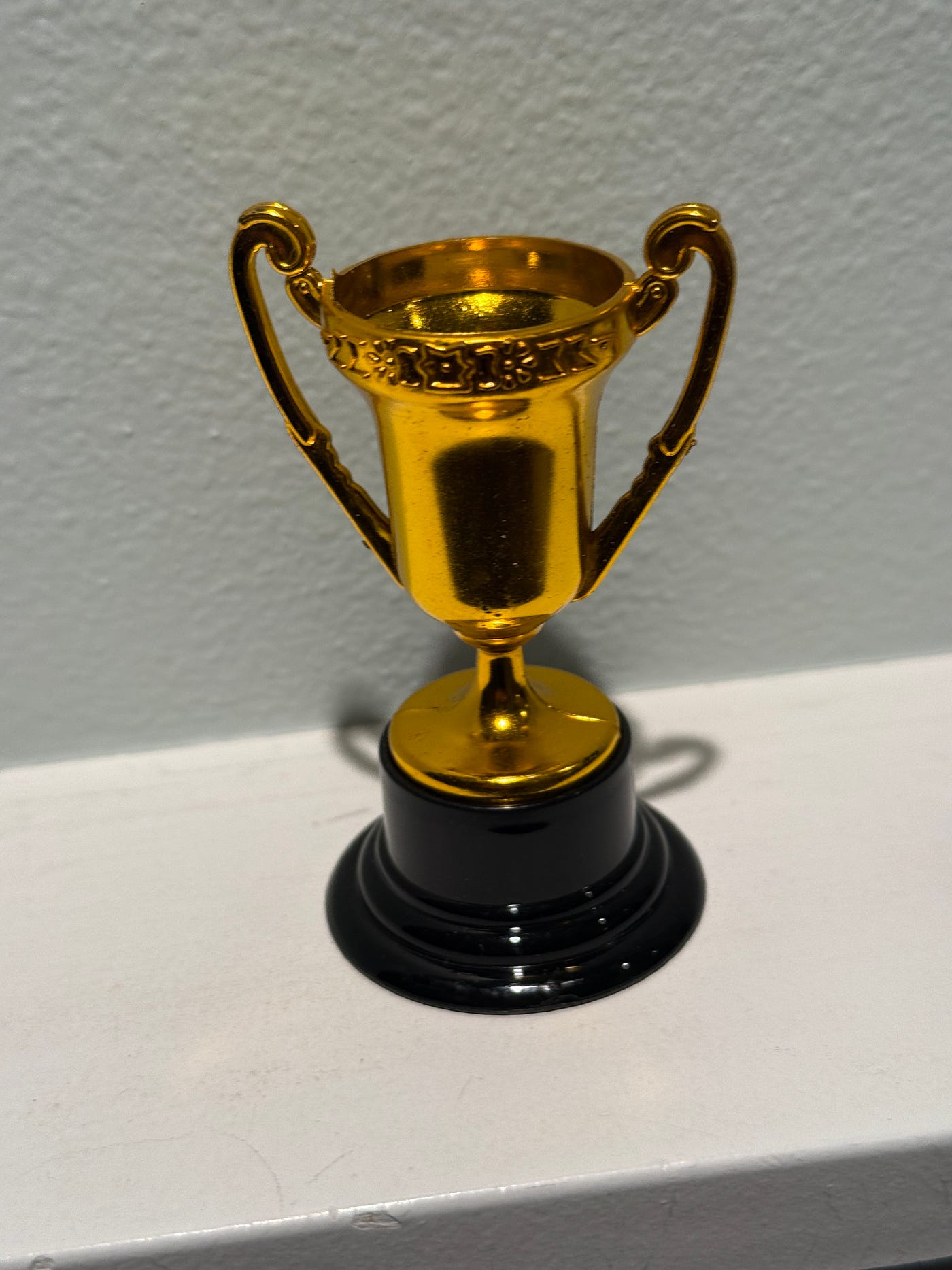 After so many years of getting my kids to swim meets (mostly) on time I feel I should at least get a participation trophy. Picture by author.