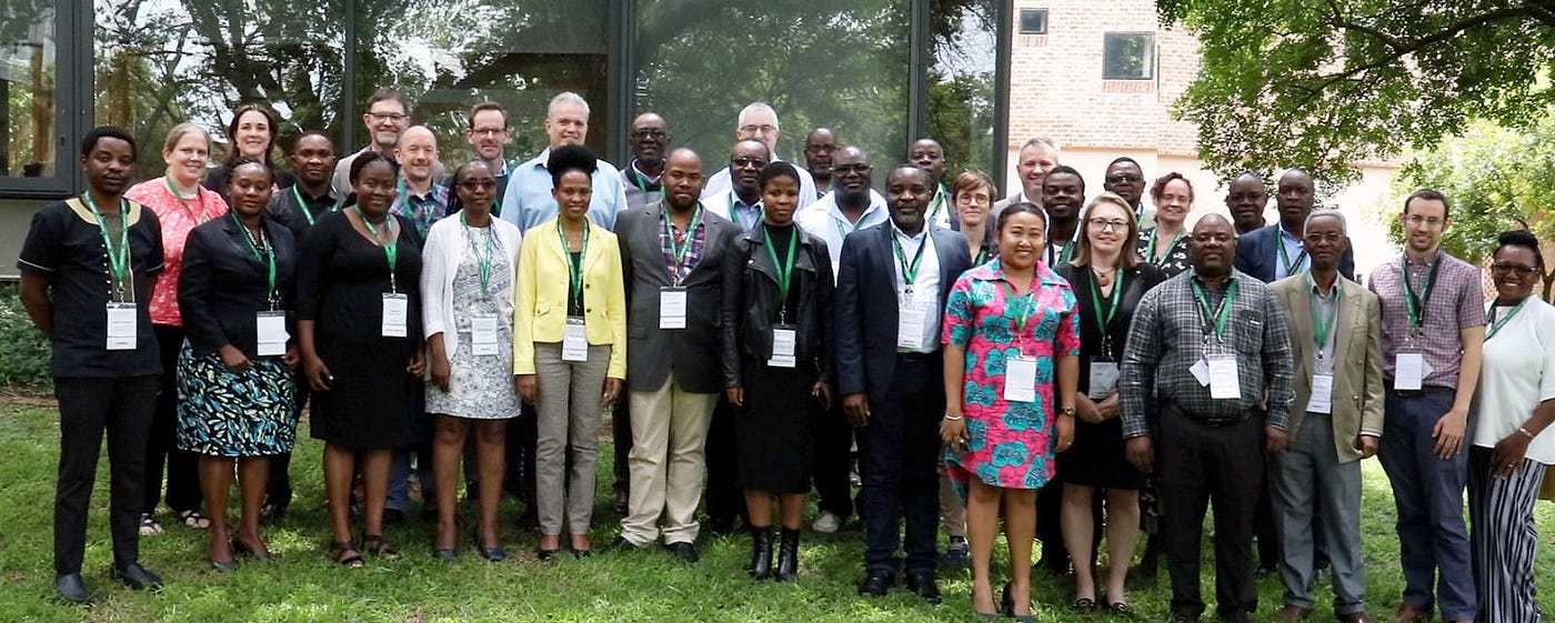 Colleagues from FoSTA Health gather outdoors for a photograph. Photo credit: FoSTA HEalth