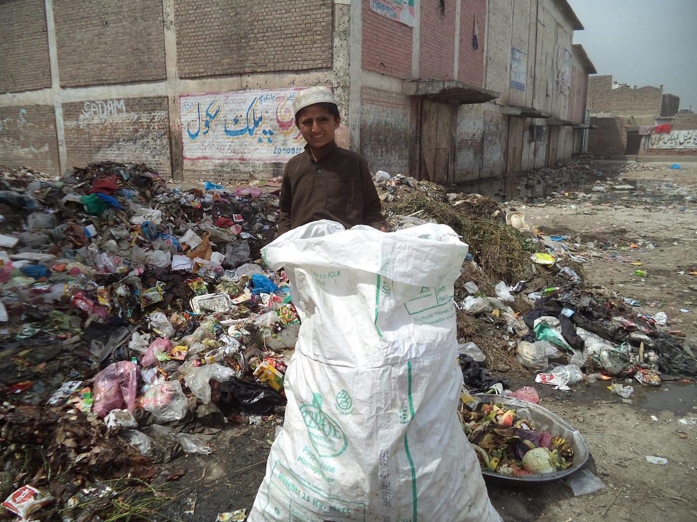 Nasir Khan , a waste-picker poses for a photo in Peshawar, Pakistan. Photo by the author