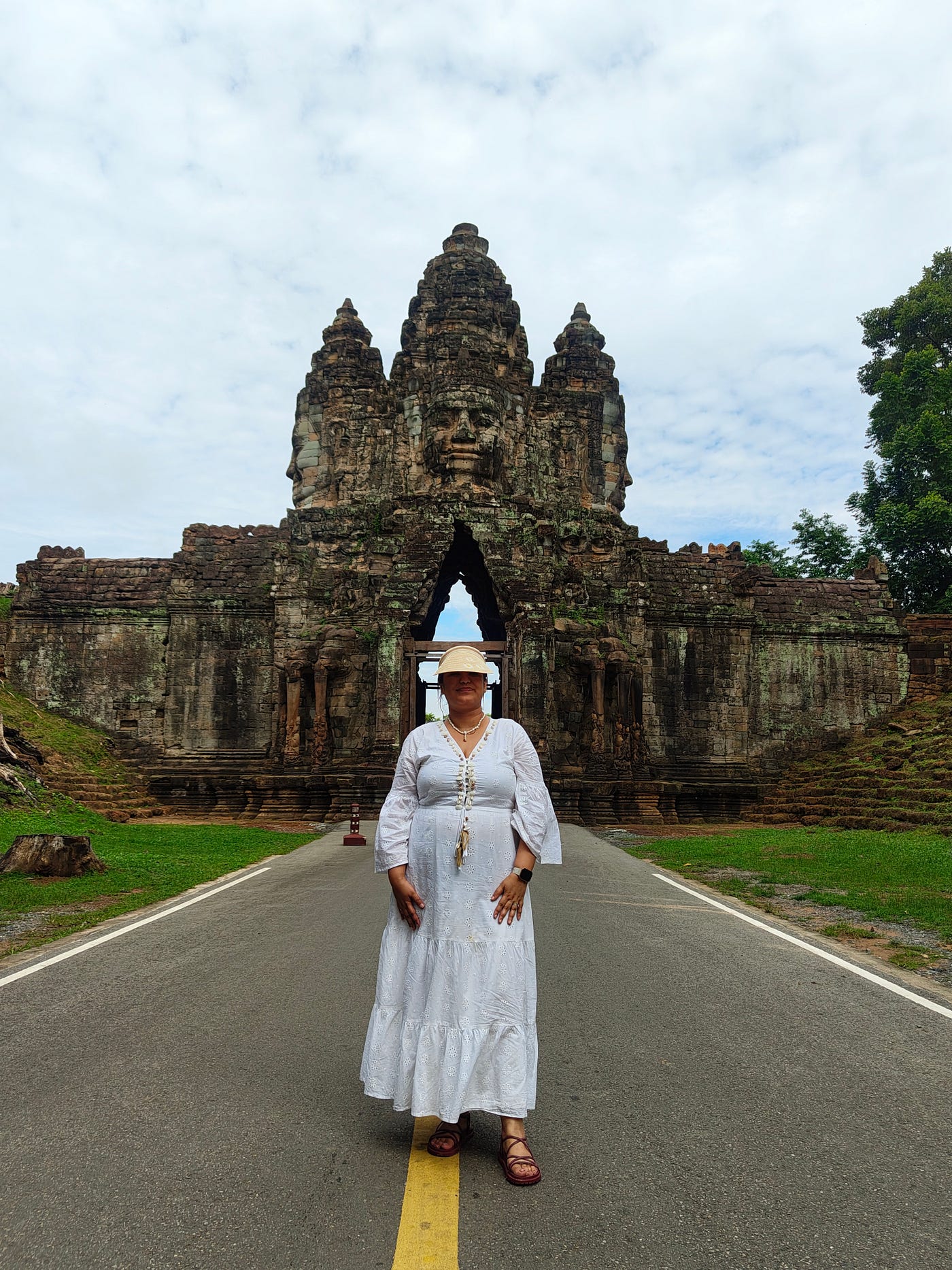 Author at the entrance of the Bayon, Angkor Thom