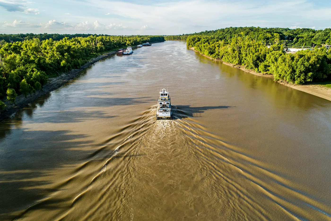 Boat traveling across a canal