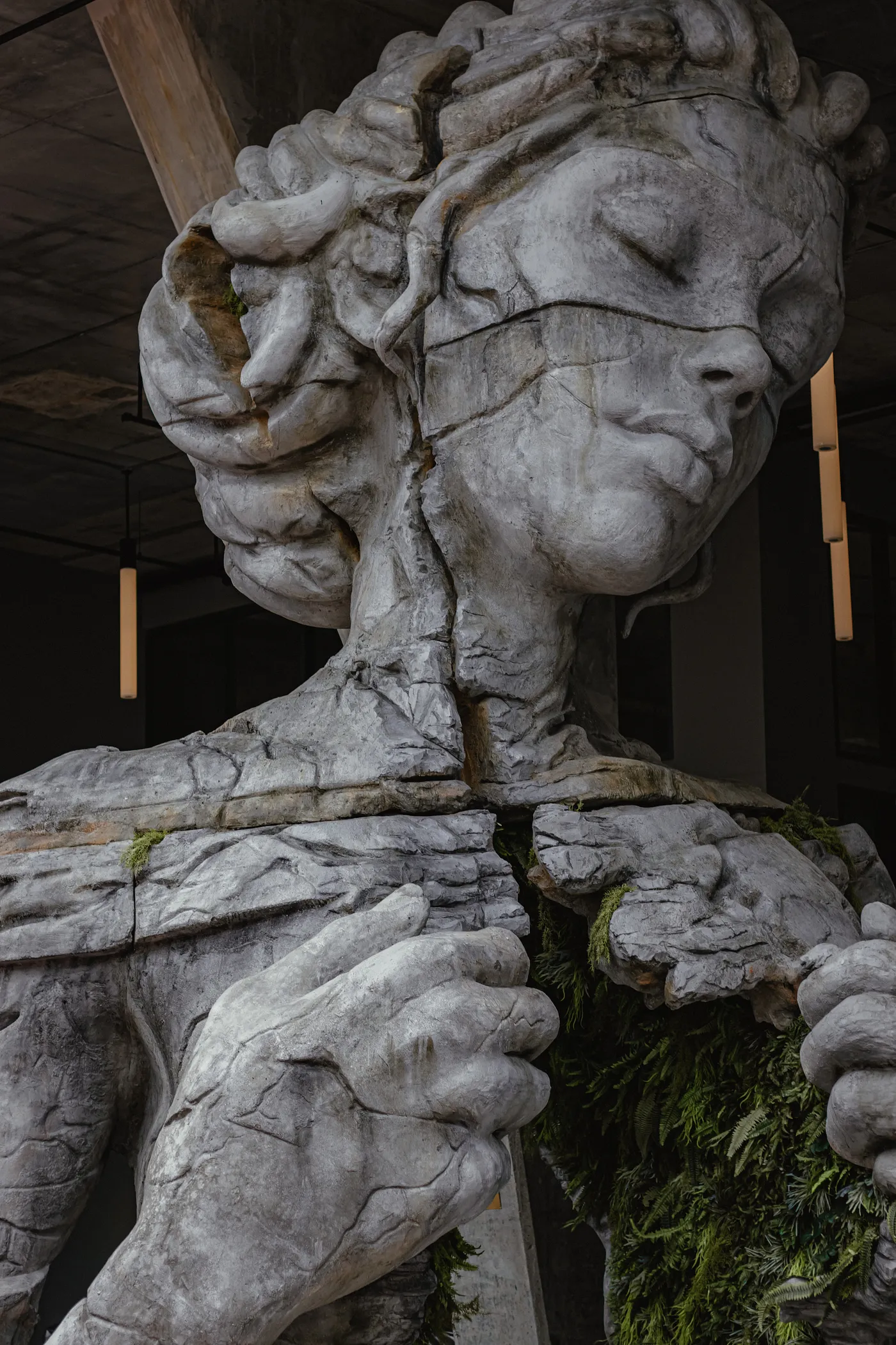 gray concrete statue of woman 