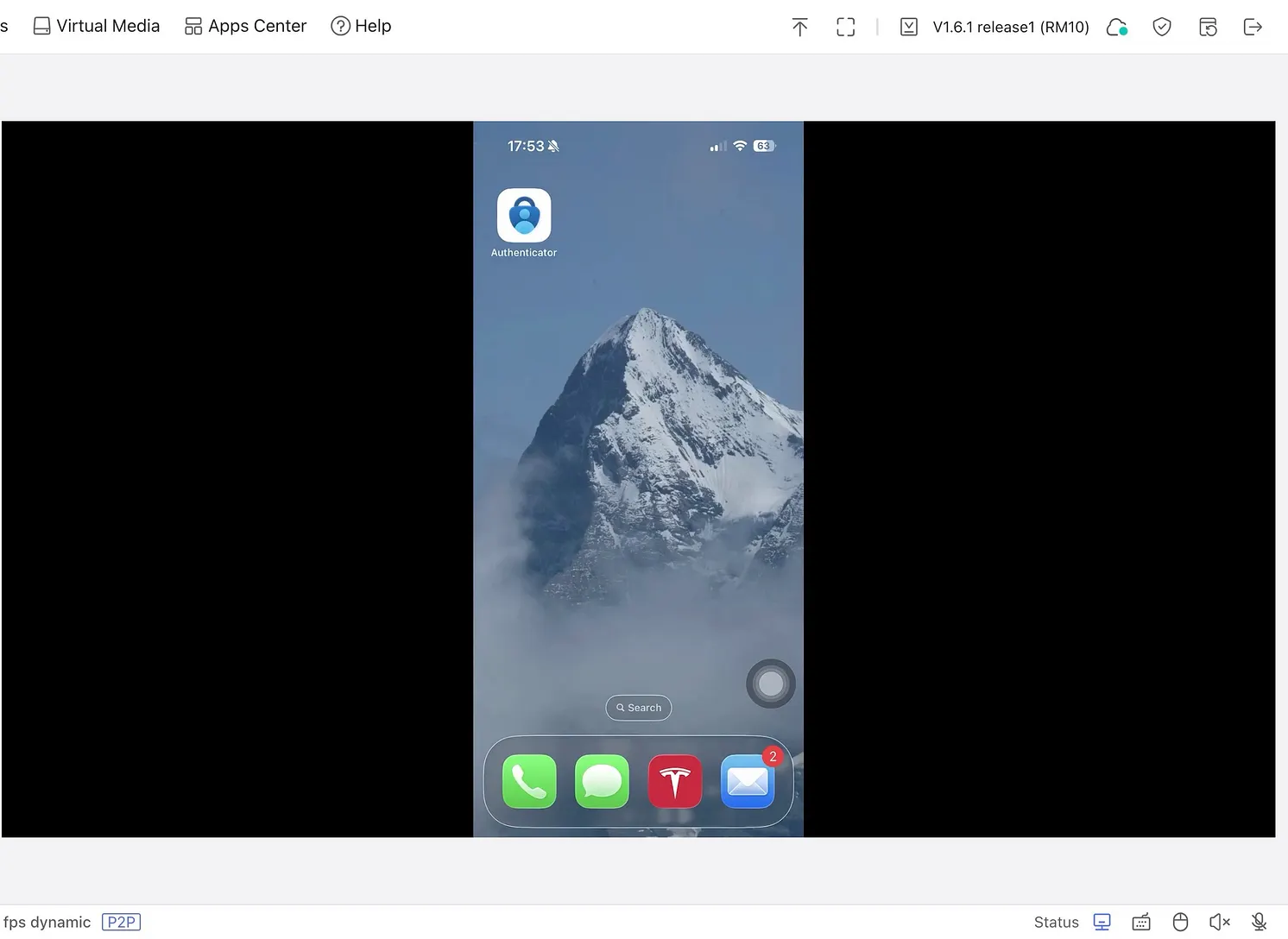 GL KVM website (on laptop) with iPhone under control