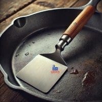 Metal spatula on cast iron