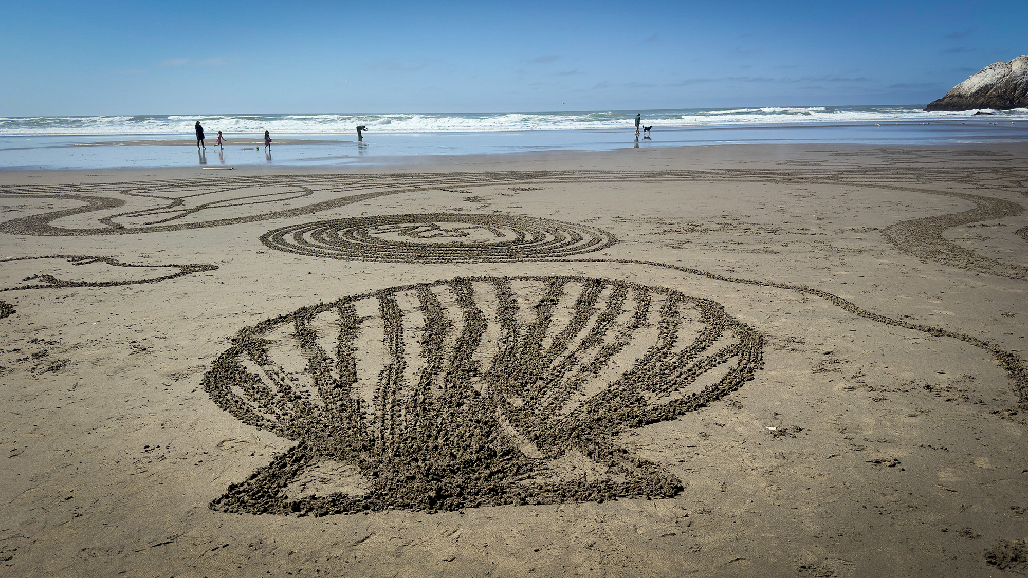Ocean Beach goes full crop circle at this massive sand art gathering