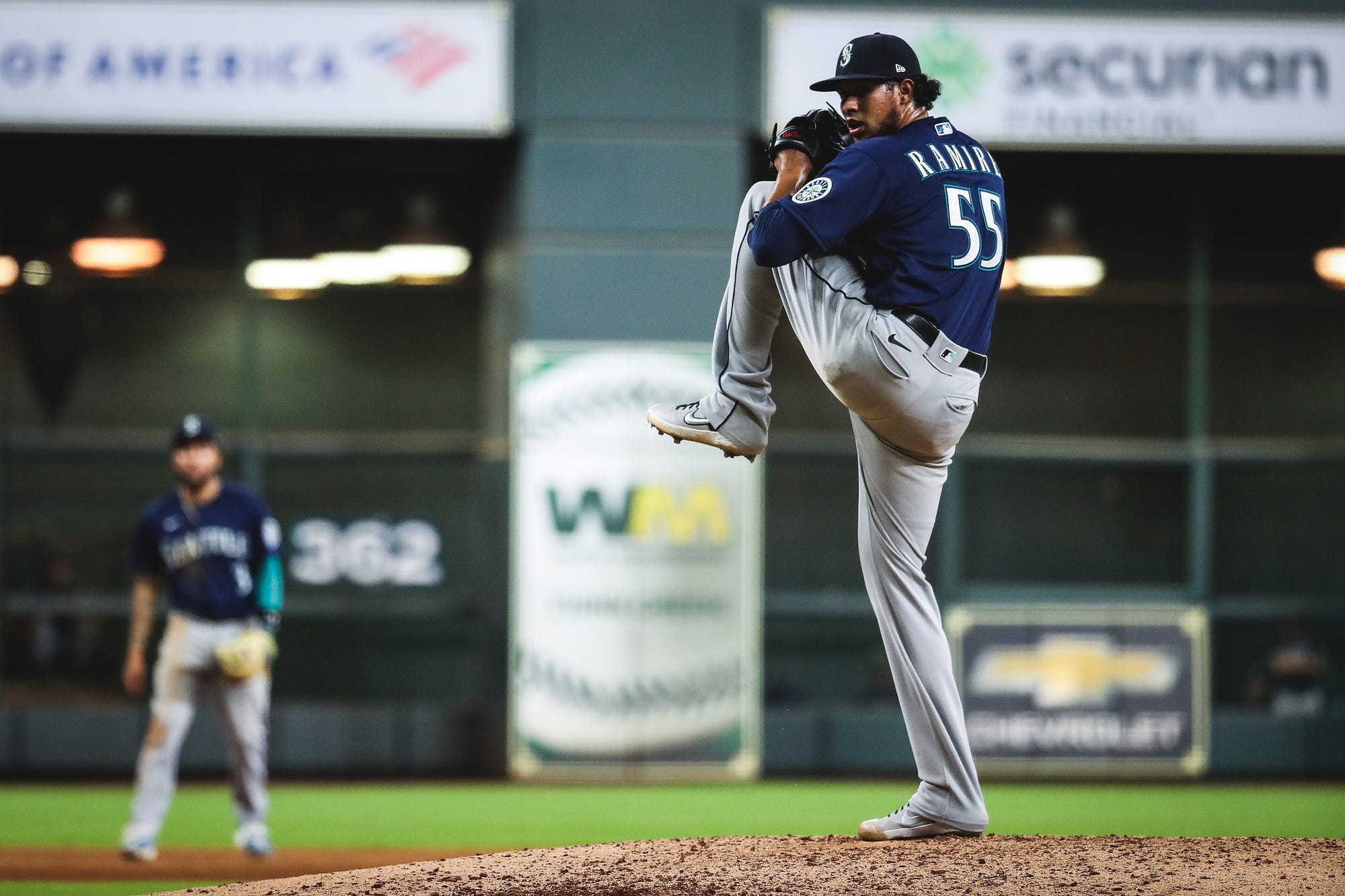 Seattle Mariners' Yohan Ramirez pitches during a spring training