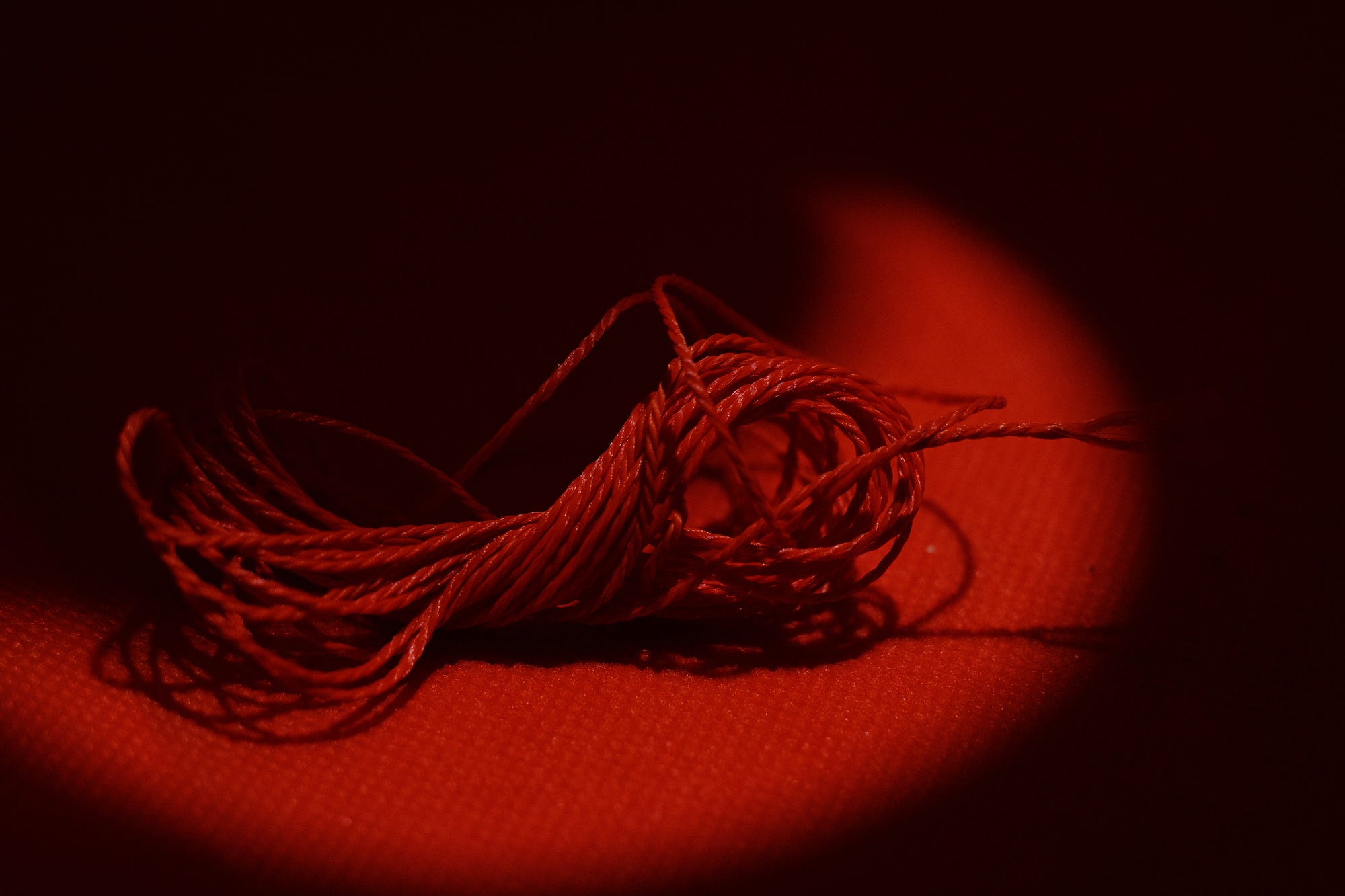 The Legend Of The Red Thread. It tangles, contracts and stretches