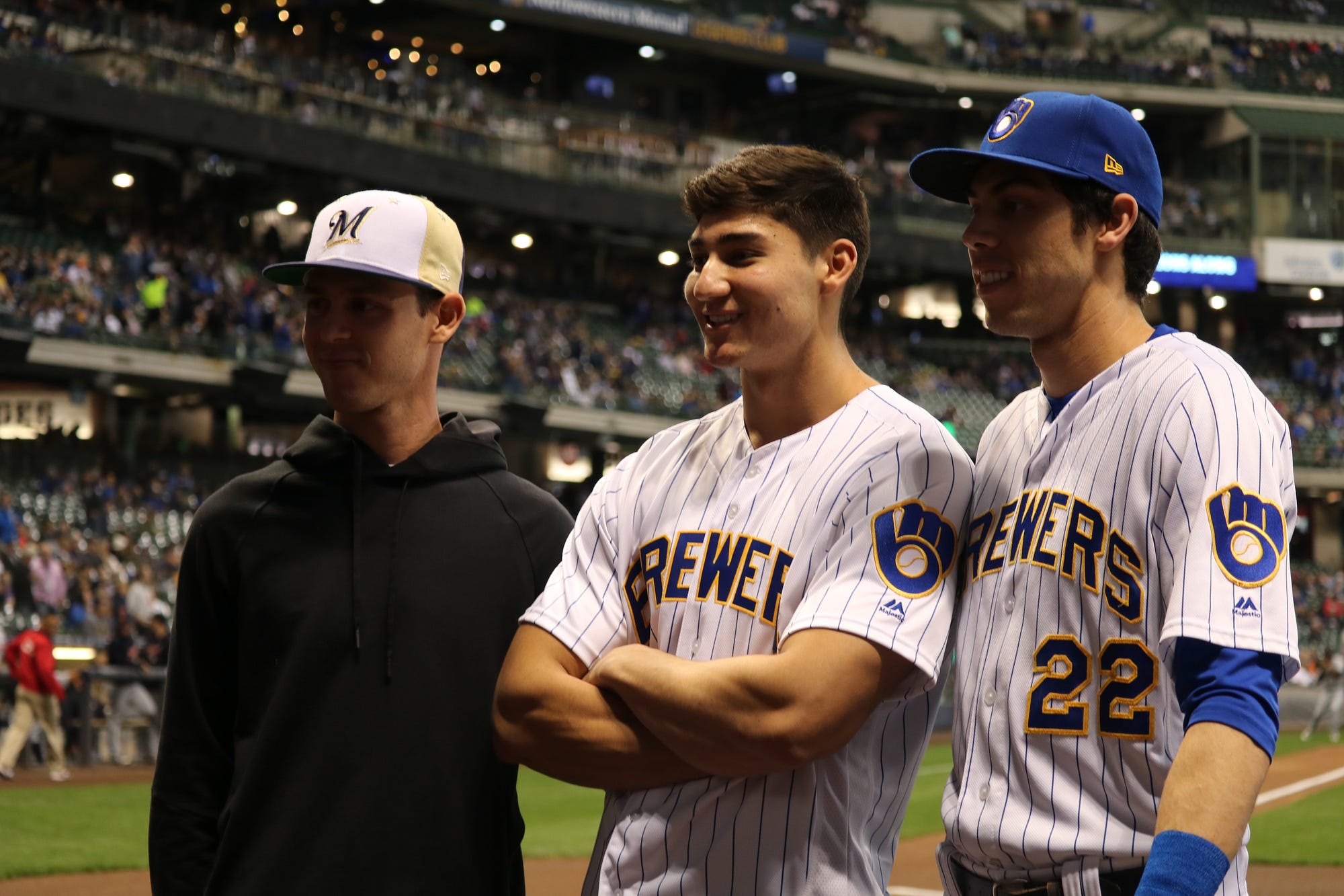 Cameron Yelich Throws Ceremonial First Pitch, by Caitlin Moyer