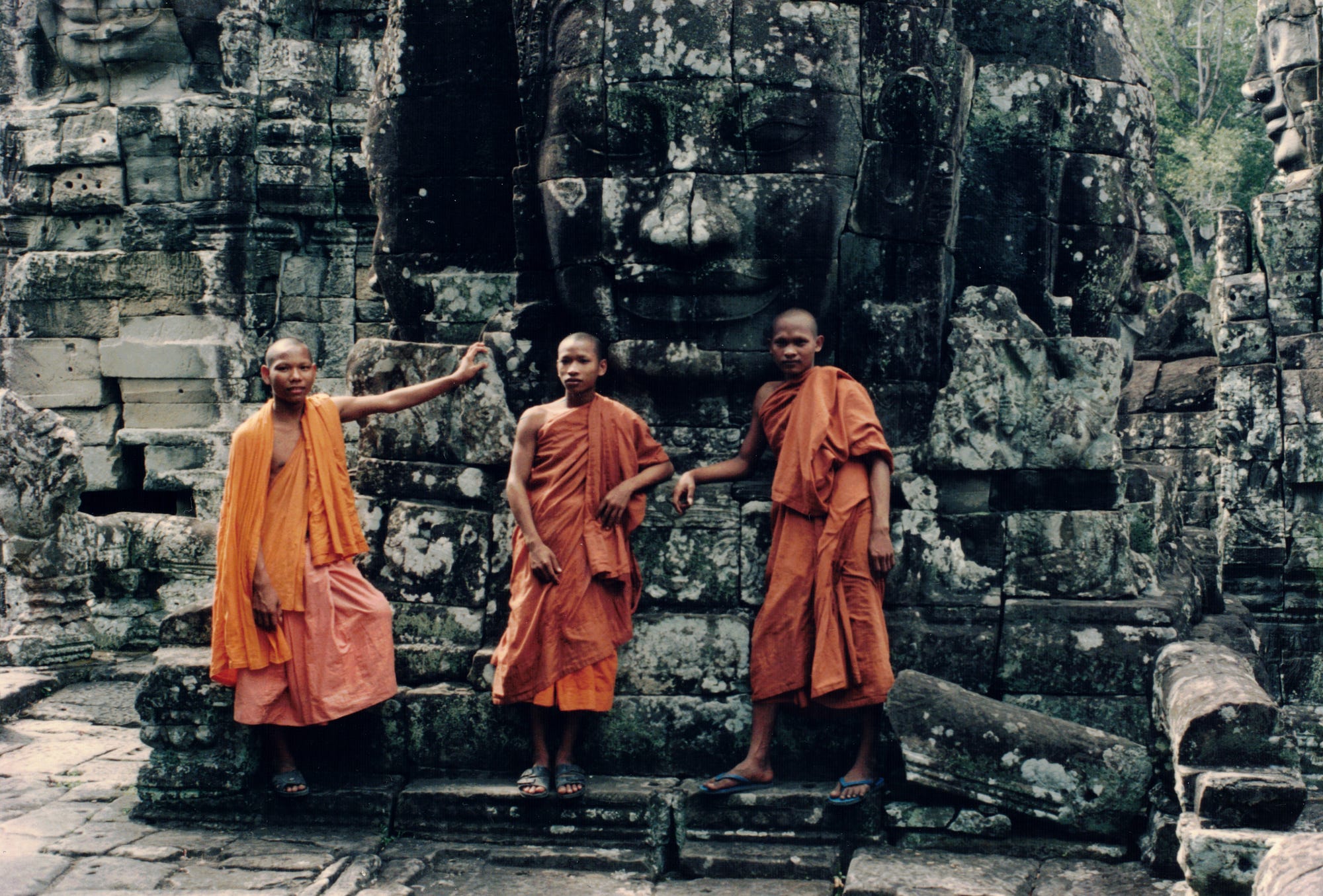 monks dressed in orange Why Buddhist Monks Wear Orange Robes & Shave Their Heads?
