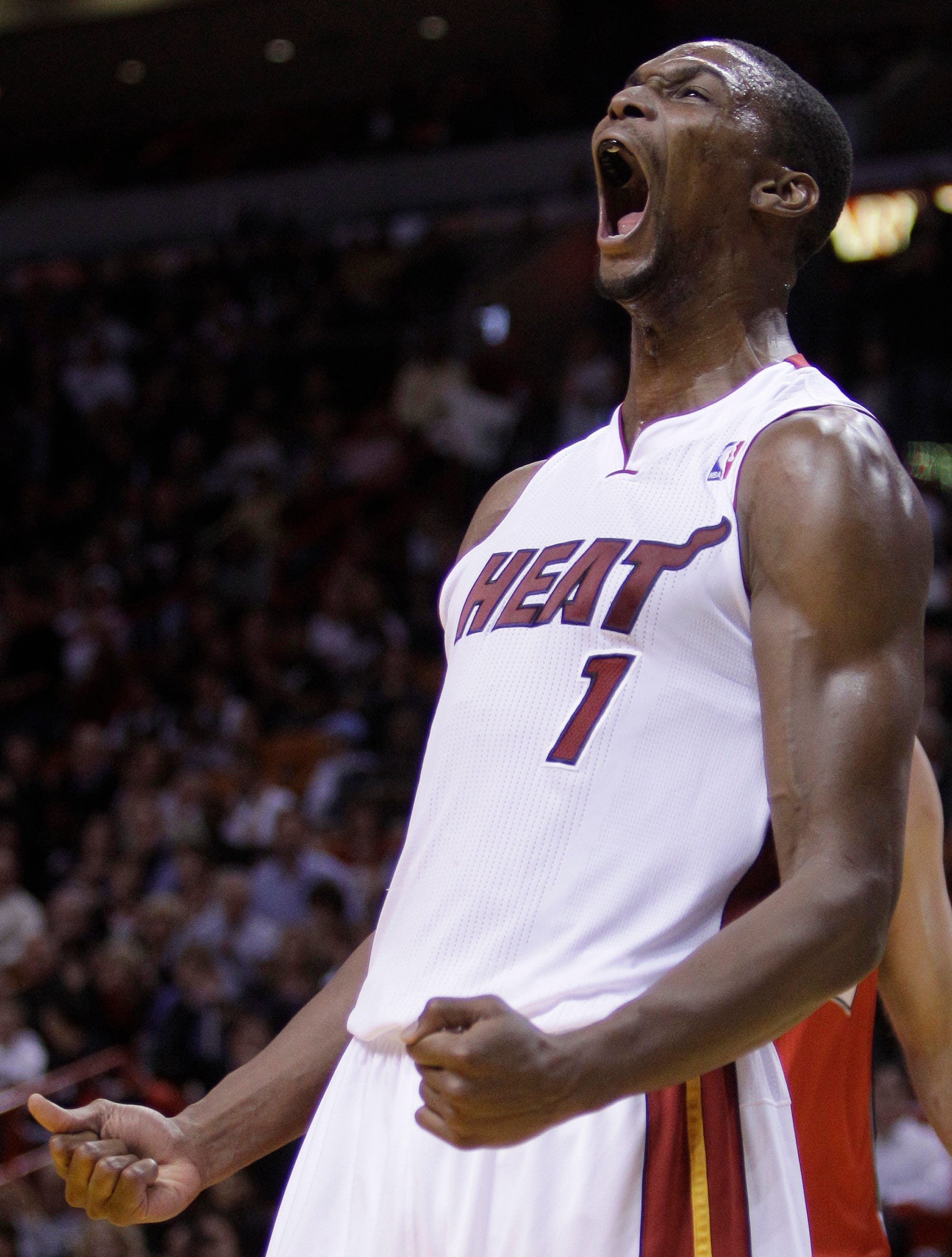 Bosh decides to stay with Heat