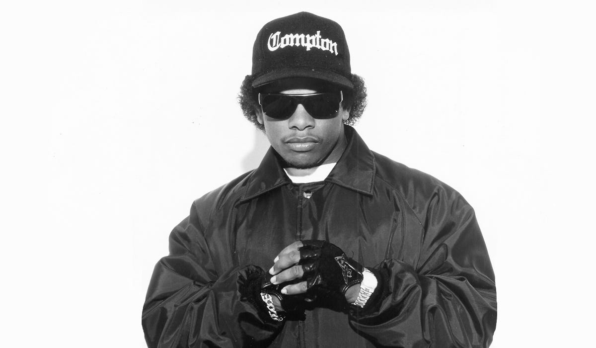 AI Generated Photo of 2Pac and Eazy-E meeting at a club. I know it doesn't  look exactly like Eazy-E, but the height is correct. It would have been  interesting to see E