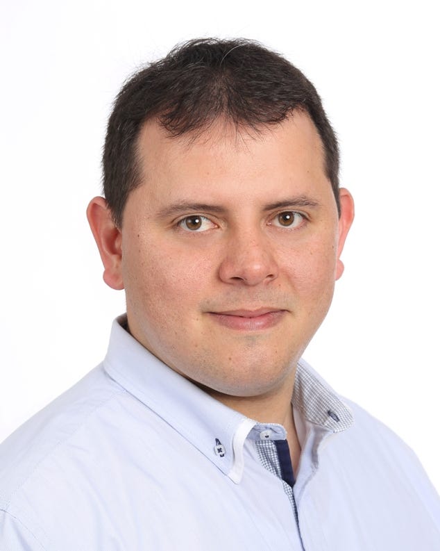 César Augusto Delgado R. Medium