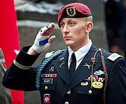 Why did the military wear berets?