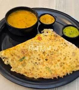 Crispy dosa served with chutney and sambar at Pasi Rusi, a popular South Indian restaurant in Singapore.