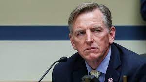 There are some who might say this photo proves that even men can have Resting Bitch Face, but it’s not. It’s a picture of Gosar laughing at a joke. CNN