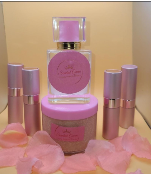 Pink and purple beauty products displayed with pink flower petals.