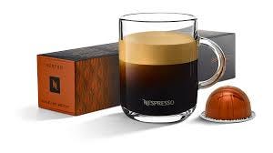 Hazelino Muffin Nespresso coffee capsule — a warm light brown aluminum pod designed for Nespresso machines, offering a smooth espresso with sweet hazelnut and subtle vanilla pastry notes.