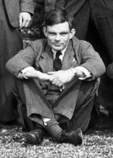Fig. 1 Alan Turing in the Ratio Club 1952 Picture: Wikimedia Commons, Wellcome Collection.