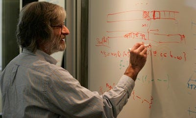 Fig. 1: Computer scientist whiteboarding at Microsoft