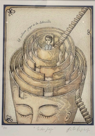 Author’s photo. Art by Fito Espinosa. Caption: el extraño juego de los laberintos — the strange game of the mazes.