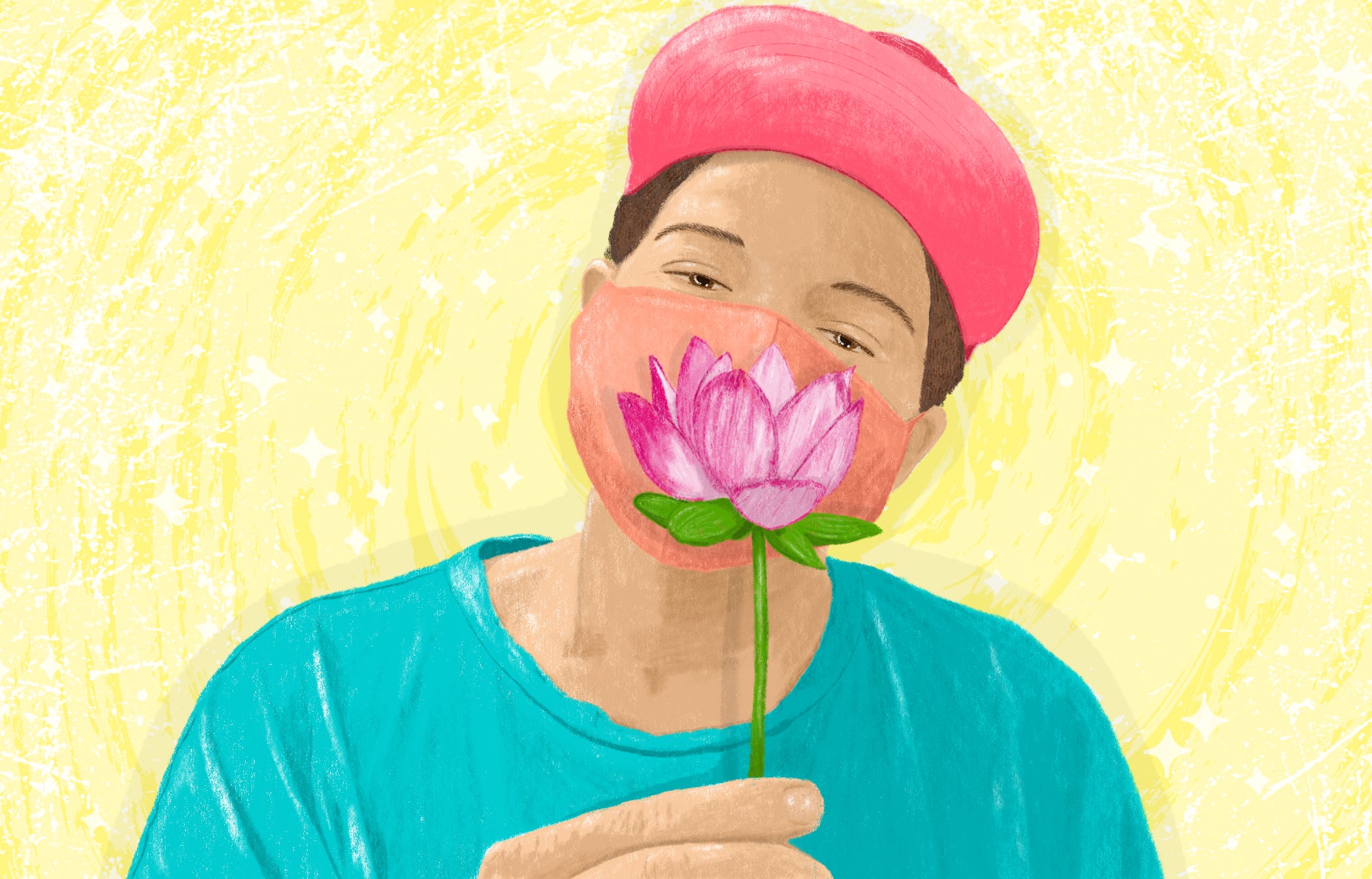 A short-haired person with light brown skin wearing a pink baseball cap, a light teal shirt, and a sherbet-orange face mask, holds a lotus flower in front of their lower face.