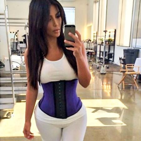 Kim Kardashian's waistline looks tiny in a new figure-hugging