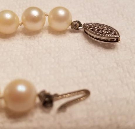 The Art of Pearl Knotting in Jewelry-Making: Enhancing Pearls' Natural