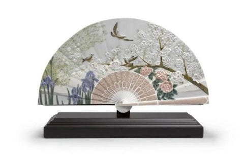 Lladró’s Iris and Cherry Flower Fan is ornately decorated with traditional Japanese symbols and imagery.