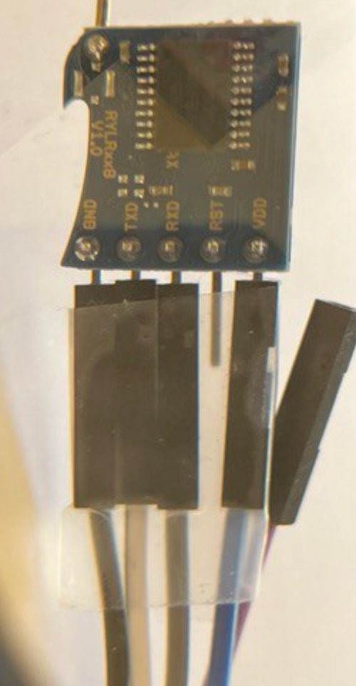 Other end: black to GND, white to TXD, gray to RXD, RST is open, blue to VDD. Please be aware that the RYLR will not fare well if it is plugged in with power going to ground and vice-versa