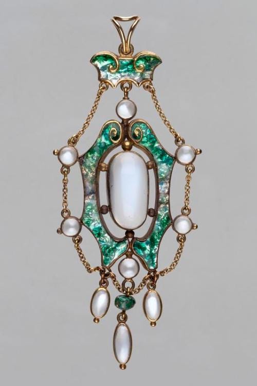 Gold Mounted Enamel And Moonstone Pendant (circa 1907) by James Cromar Watt Wikimedia Commons Image License