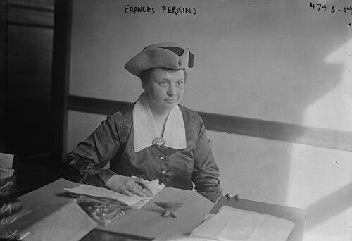 Perkins at her desk c. 1919 | Public Domain