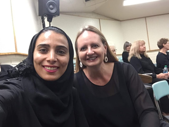 Two women taking a selfie.