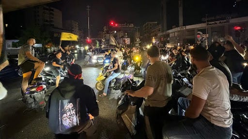 Hezbollah supporters take to the streets in the southern suburbs of Beirut to protest against the trilateral agreement that was signed between the US, Israel and Lebanon on 27 June 2026.