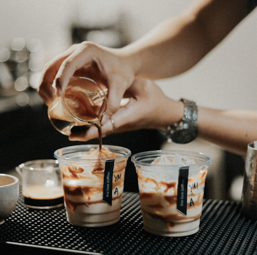 FROM BEAN TO CUP: The Box Coffee baristas pouring coffee in action. (Photo credit by: The Box Coffee)