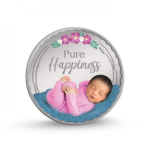 NEWBORN BABY SILVER COIN. A newborn baby silver coin is a special… by Silvera Digital Medium