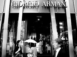 The logo of EMPORIO ARMANI is seen at Ginza district in Chuo Ward, Tokyo on  November 23, 2020. Giorgio Armani S.p.A. is an Italian luxury fashion house  founded by Giorgio Armani which