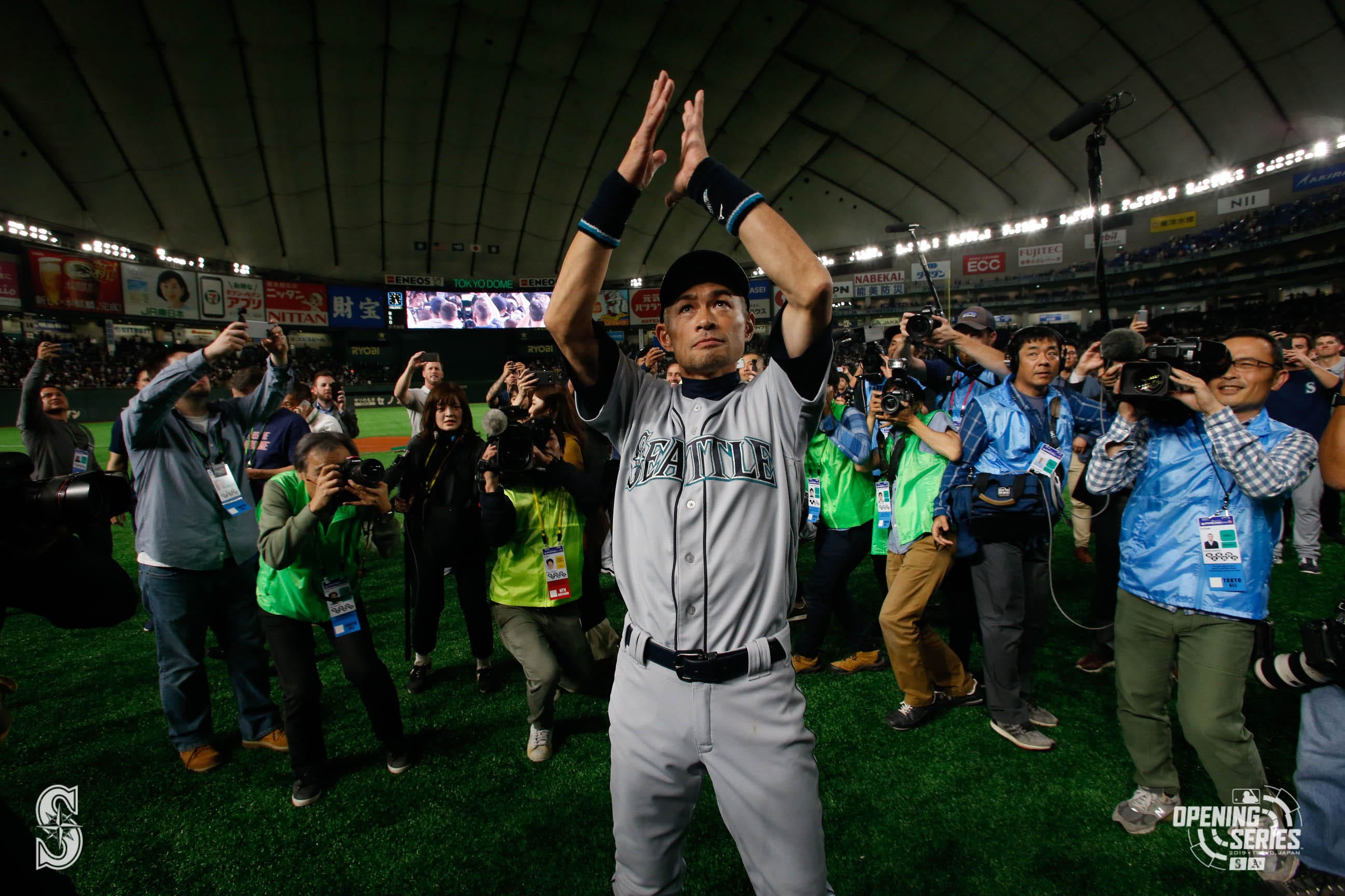 Former Seattle Mariners player Ichiro Suzuki poses with the trophy during a  ceremony honoring Suzuki with the franchise achievement award before the  Major League Baseball game at T-Mobile Park on September 14