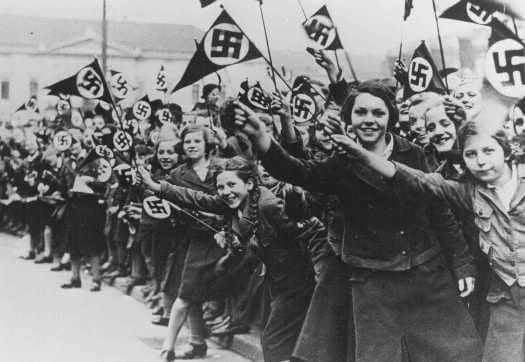 Austrians cheering Nazi troops as they enter Austria in 1938 in the Anschluss, when Hitler annexed his homeland. This event, one year after Lamarr fled Vienna, haunted her for the rest of her life. Image: Holocaust Encyclopedia