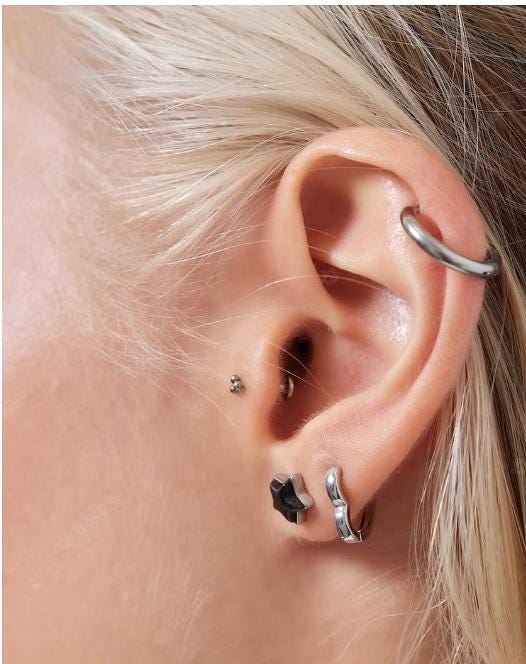 Discover the Hidden Gem of Ear Piercing Near Me | by Xpose Tattoos | Medium