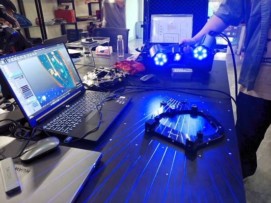 Portable 3D Scanners: Bridging Shop Floor and Metrology Lab