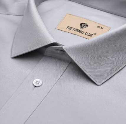 Crisp formal dress shirt collar with structured collar stays for a sharp professional look
