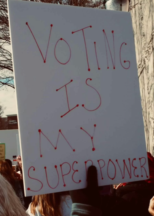Protest sign advocating for voting rights. Image provided by Barbara Burgess on Unsplash.