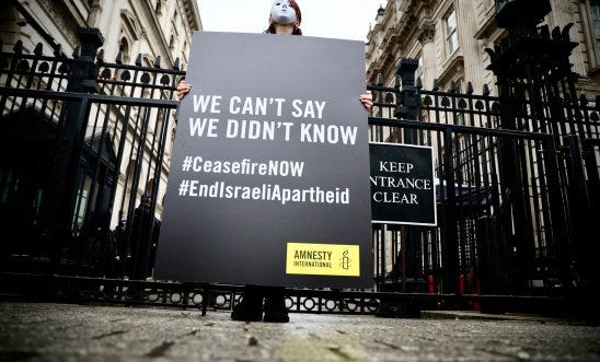 Amnesty International staging a silent vigil outside Downing Street, in solidarity with civilians in Rafah (Marie-Anne Ventoura, 14/02/2020)