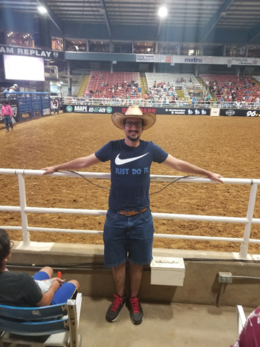 Man posing with the rodeo.