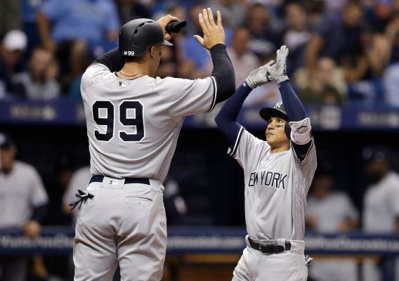 Yankees' Sabathia finally tops Red Sox, Professional