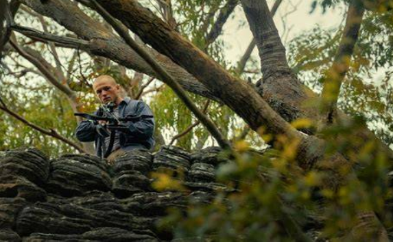 A View From the Couch: The Primal Unmasking of the Predator Next Door — ‘Apex’