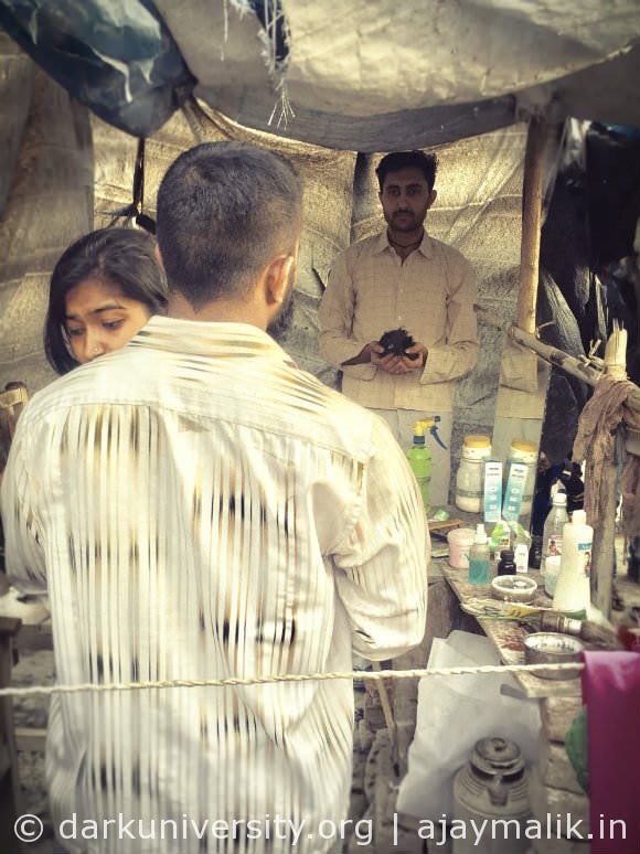 Bed creaks as Rukmani takes a turn and wipes off sweat from her