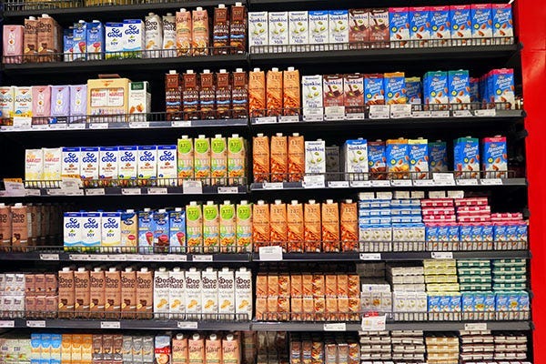 The vegan milk section at Gourmet Market in Bangkok. There are so many vegan milk options in Bangkok with new products popping up all the time.
